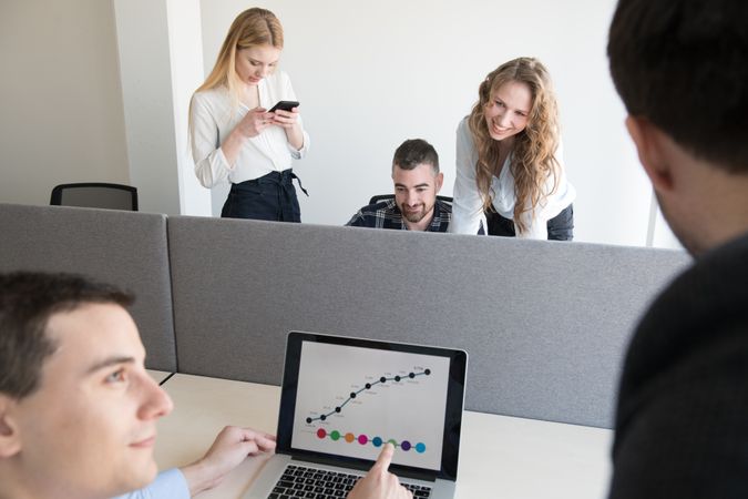 Group of colleagues working in contemporary office