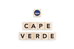Wooden blocks bearing the name and flag of Cape Verde. Cape Verdean and African Culture, national identity, travel, and geography in a copy space design.