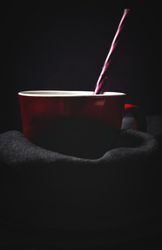 Cup of milk on table