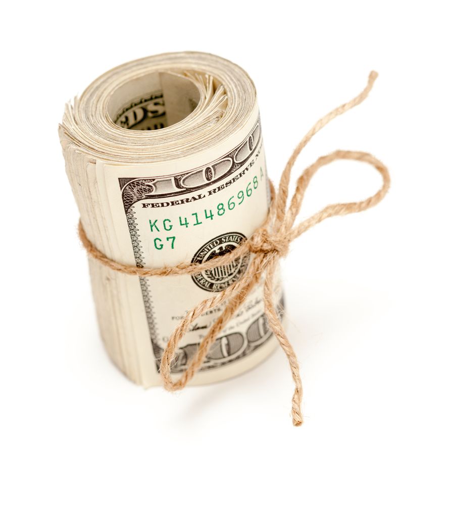 Roll of One Hundred Dollar Bills Tied with a Jute String