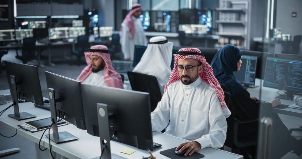 Group of Multicultural Middle Eastern Men and Women Working in Research Center