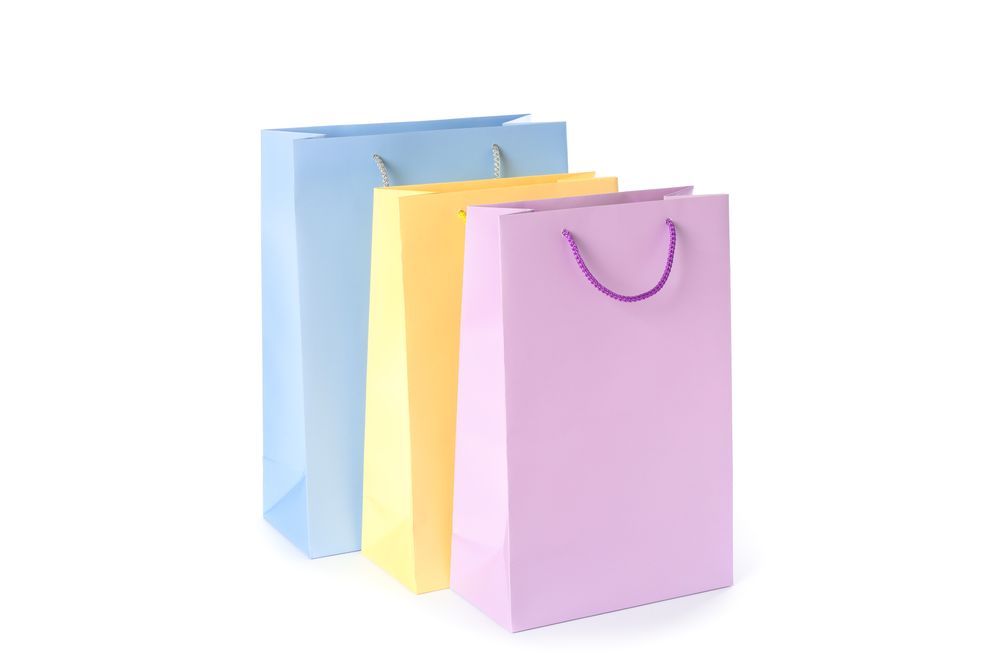 Color paper bags isolated on blank background