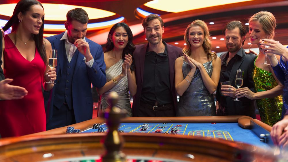 Successful Men and Women Partying in a Luxurious Casino.