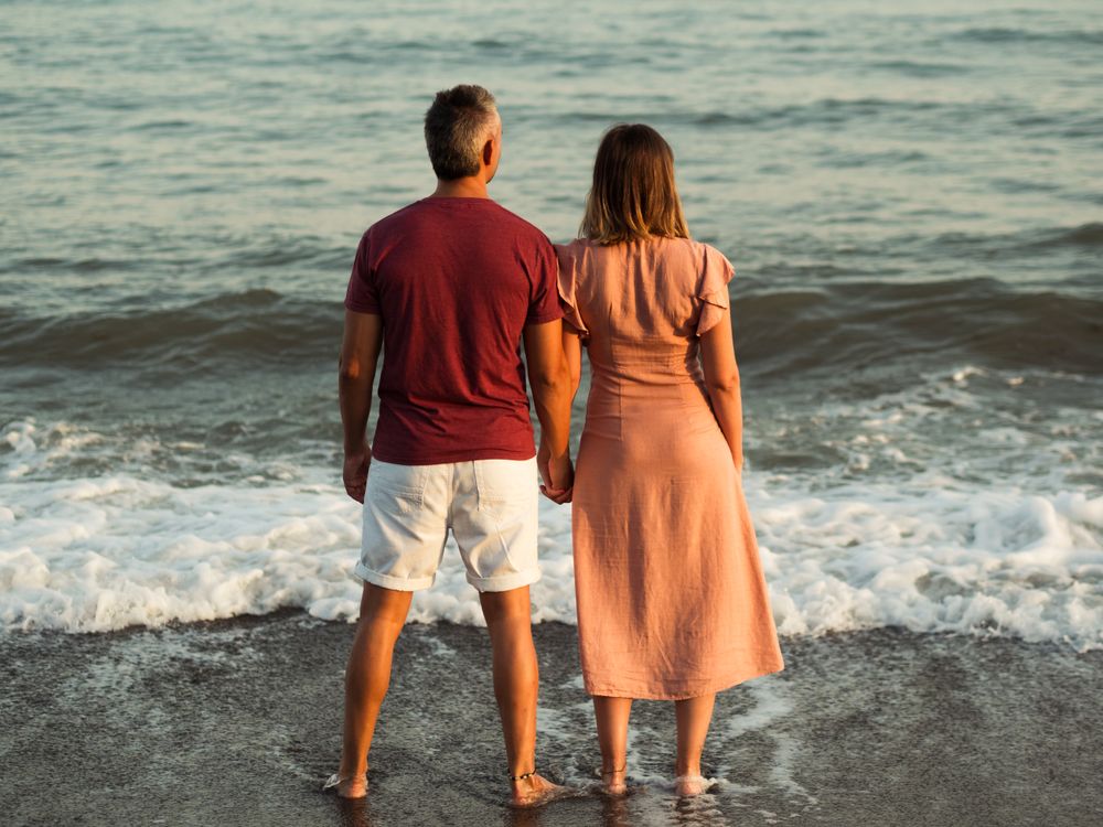 Back of couple at beach