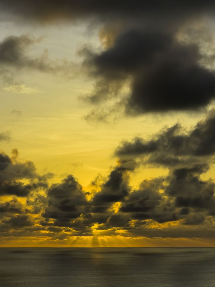 Dark Clouds And Orange Sunset Sky