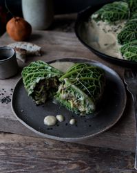 Cabbage rolls stuffed with rice on plate