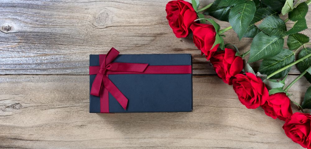 Lovely holiday gifts on weathered wood