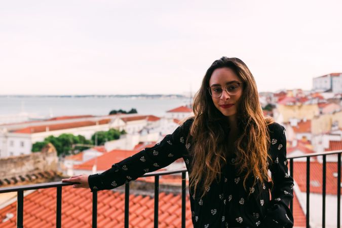 Casual woman against cityscape