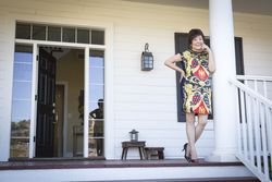 Chinese Woman On Her Front Porch
