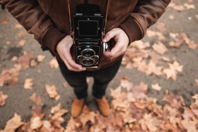 Crop traveler holding film in camera