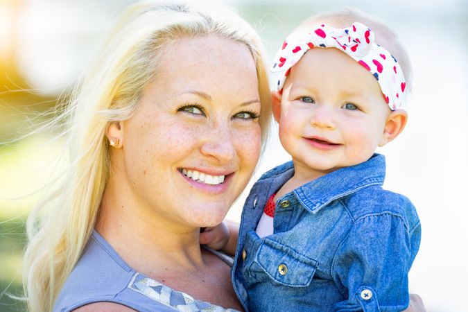 Young Mother and Daughter At The Park