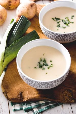 Shoot from above of two bowls of tasty Vichyssoise soups