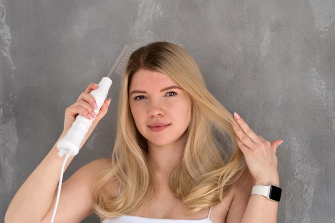 Enjoying microcurrent hair therapy.
