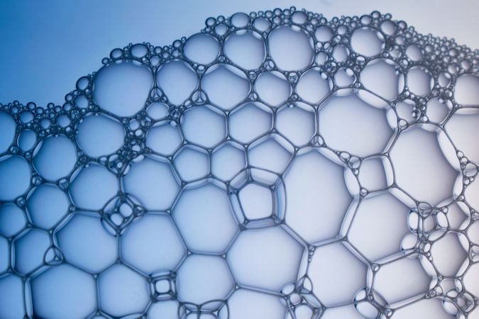 Abstract background bio technology, macro photography foam and water with gradient background. Molecule multicolor backgorund