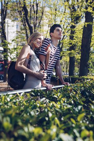 Young tourists couple standing outdoors