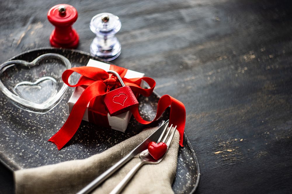 Trey with ribbon wrapped gift and salt & pepper mill