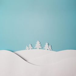 Christmas winter landscape with snowy hills and trees