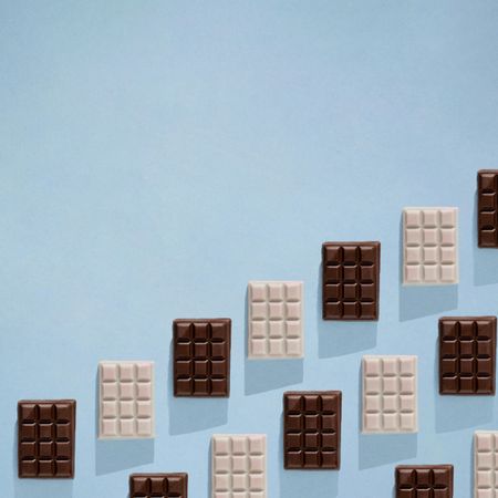 Chocolate bars in rows with copy space