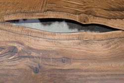 Close up of wooden table with resin
