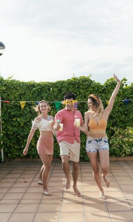 Group of friends having a pool party