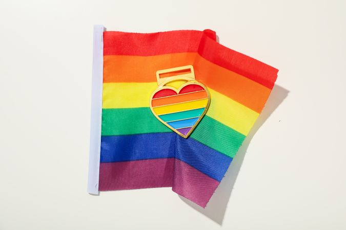 Pride parade concept, free love symbol on light background.