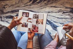 Man and woman reading a book