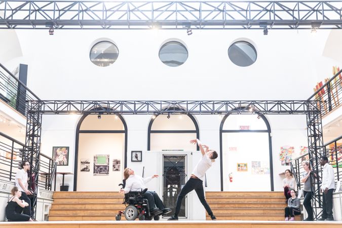MONTREAL, QUEBEC, CANADA – March 16 2019- Dancers performing in a public space, one in a wheelchair