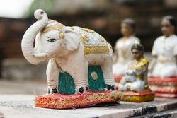 Elephant statuette with golden ornament