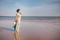 Woman gazing at sea horizon