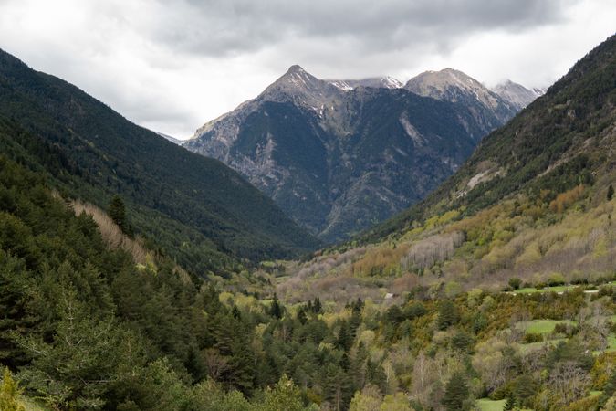 Rocky mountains covered with snow on sunny day