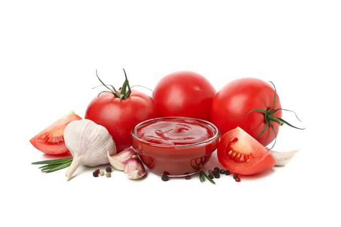 Tomatoes, sauce and ingredients isolated on neutral background