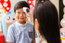 Two children playing doctor