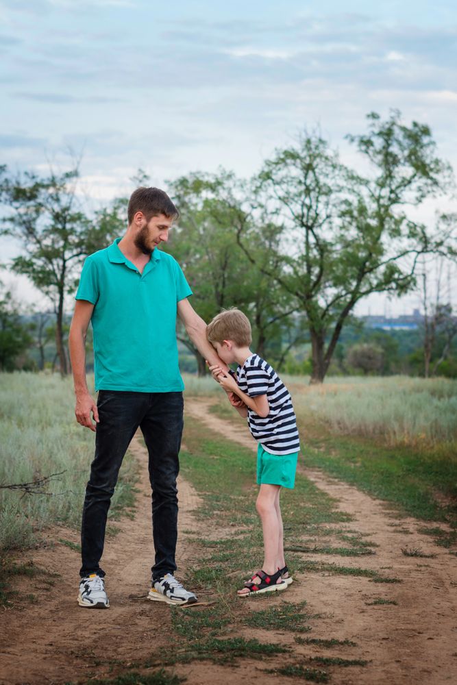 Affectionate father with son outdoor