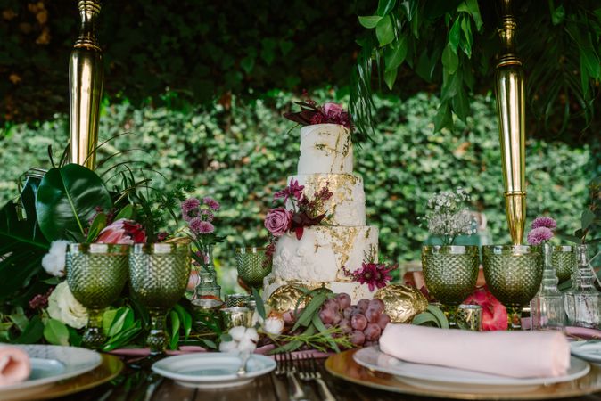 Setting wedding table with cake