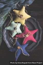 Handmade decorations of stars on dark wooden table 5pjqOb