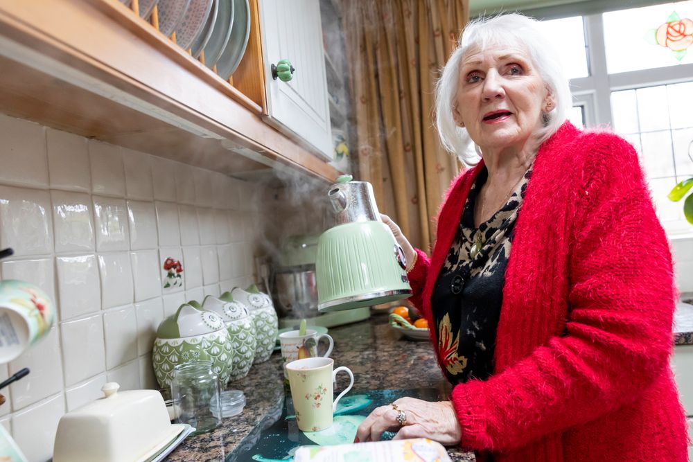 Woman at kitchen counter
