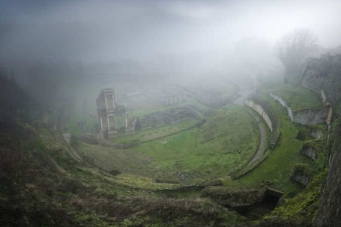 Majestic view of ancient ruins in fog