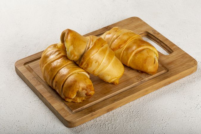 Traditional fresh baked croissants on the table.