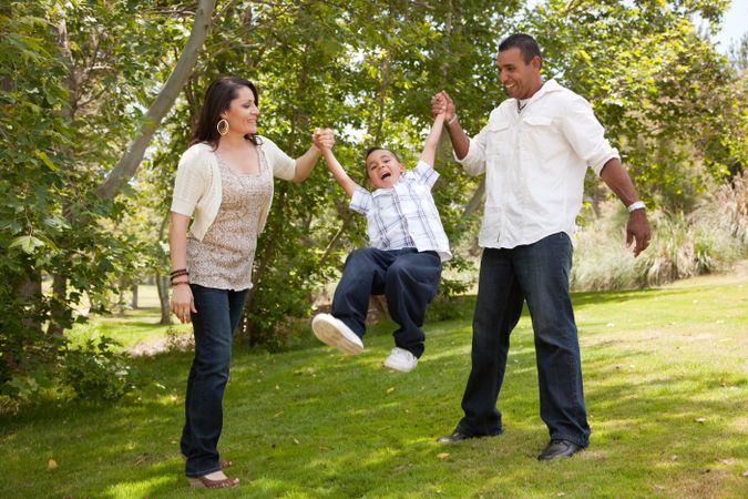 Young Family Having Fun in the Park