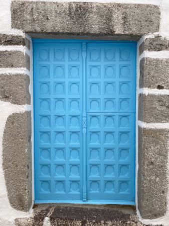 Patmian blue door with geometrical mouldings