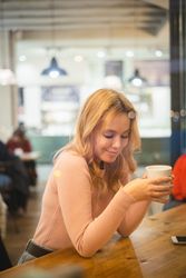 Woman having a cup of coffee