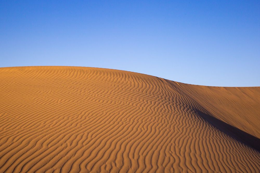 Dunes under blue sky
