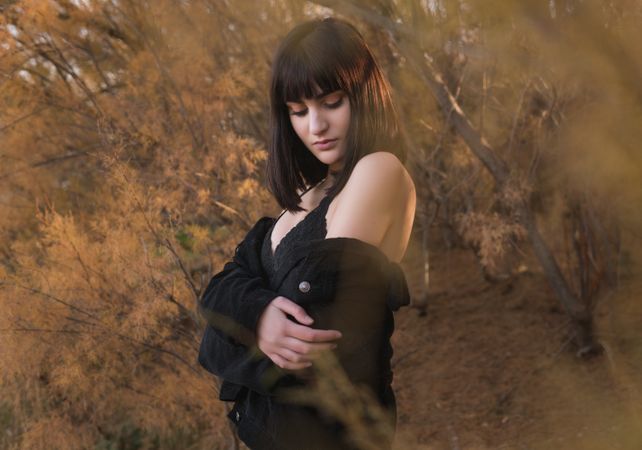 Sensual female in autumn countryside