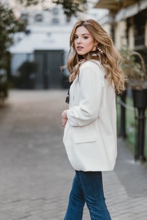 Charming woman posing on street