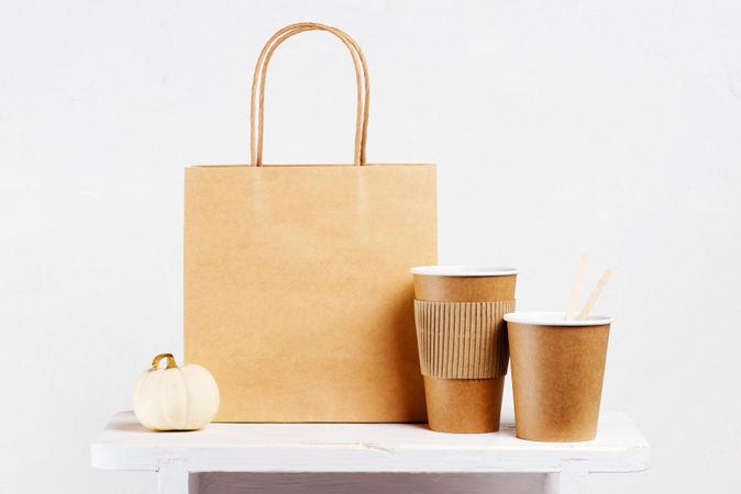 Brown recyclable shopping bags and mini squash