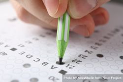 Close up of person pencilling in multiple-choice test bxJad5