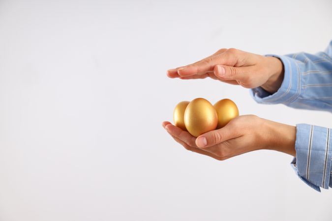 Golden eggs, pension savings, investments, retirement, space for text