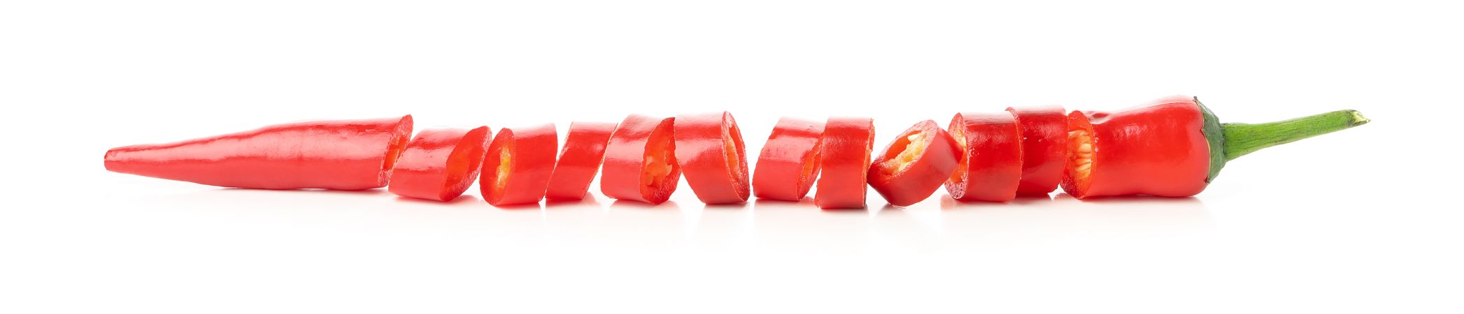Chopped chilli pepper isolated on studio background