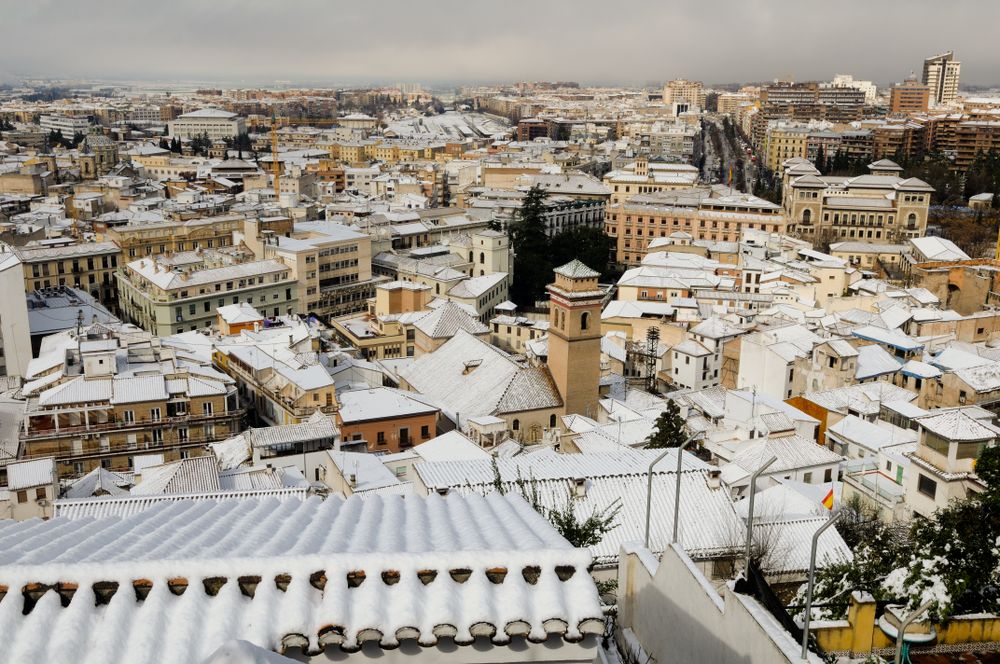 Snow storm with slush on sidewalks, Granada, Spain
