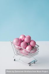Shopping cart with pink Christmas decorations bxEyj0